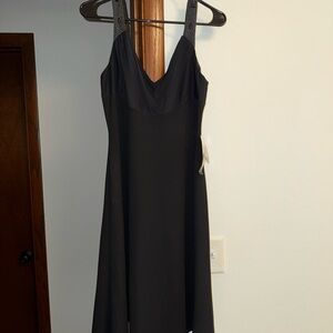 Elegant Black Dress with Patterned Straps